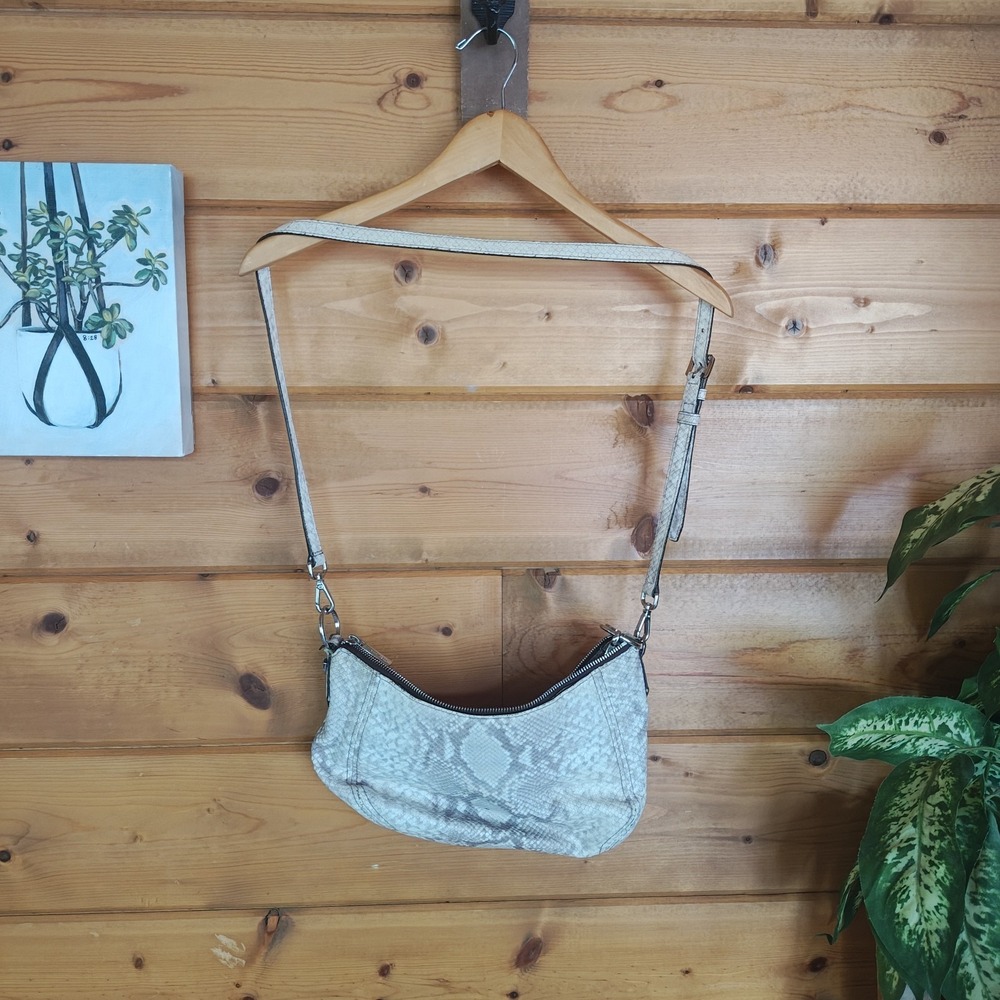 Michael Kors snake embossed handbag has multiple pockets Lightly‎ Used ZA4
